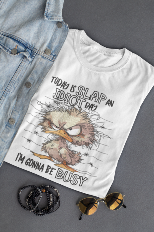 mockup-of-a-folded-t-shirt-placed-next-to-some-sunglasses-29781