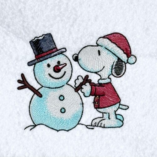 FE04611---Nosey-Dog-Building-Snowman