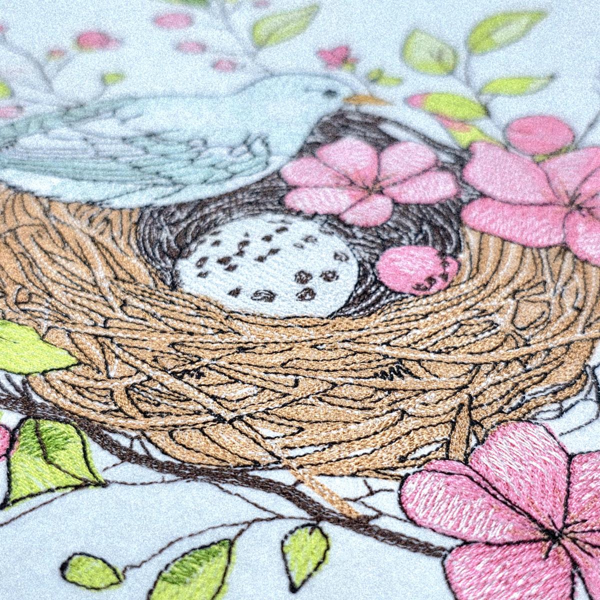 bird-resting-on-floral-nest-embroidery-design