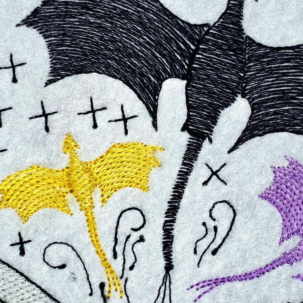 dragons-flying-out-of-a-book-embroidery-design