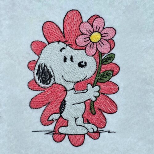 nosey-dog-holding-flower