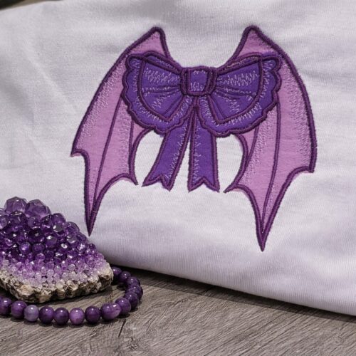 purple-bat-wing-bow-applique