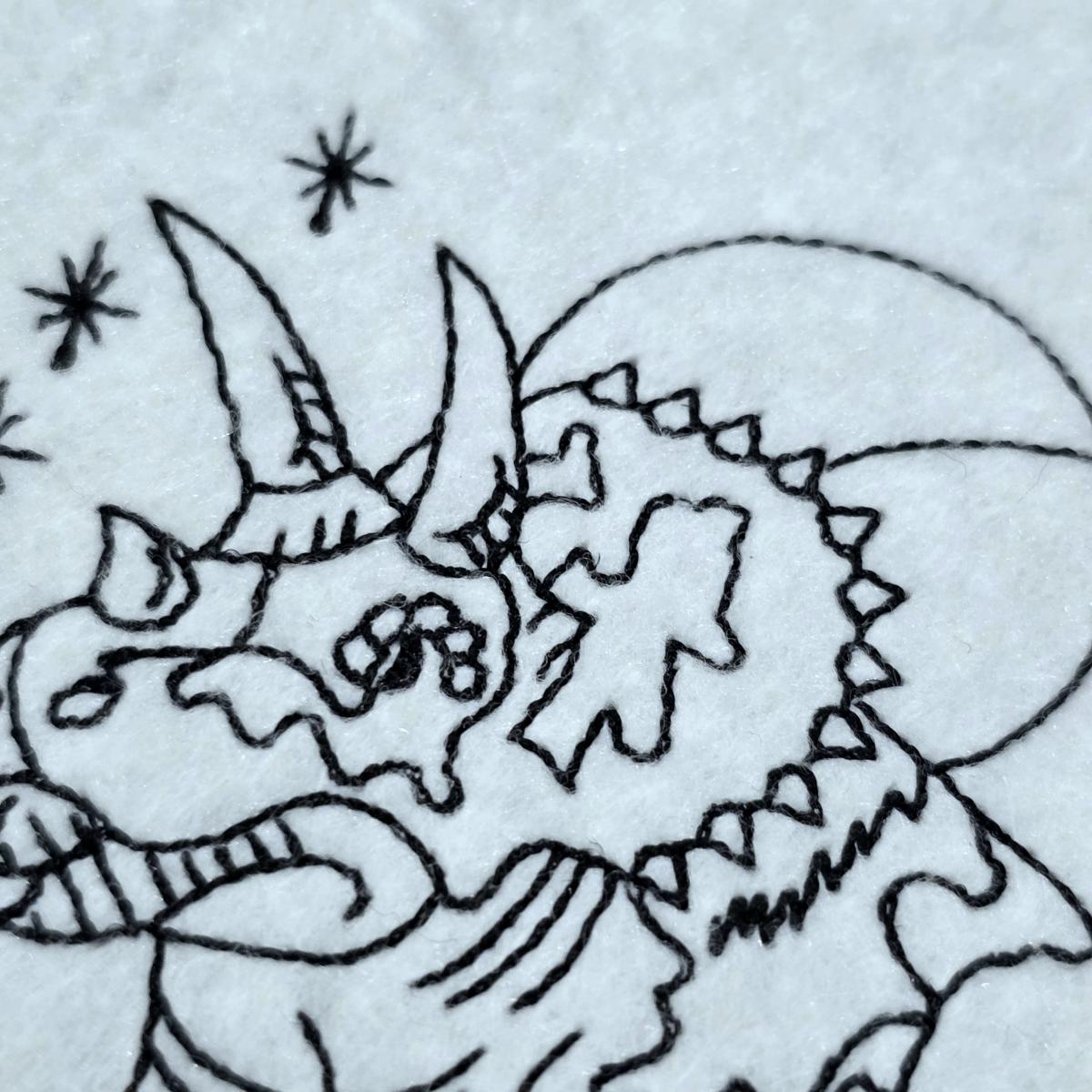 triceratops-dinosaur-with-flowers-line-art-embroidery-design