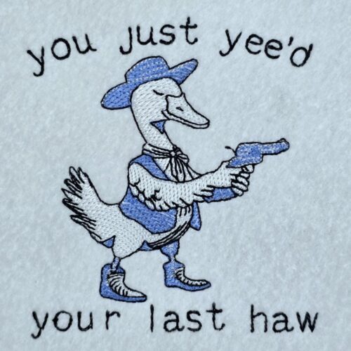 western-duck-with-pistal-quote