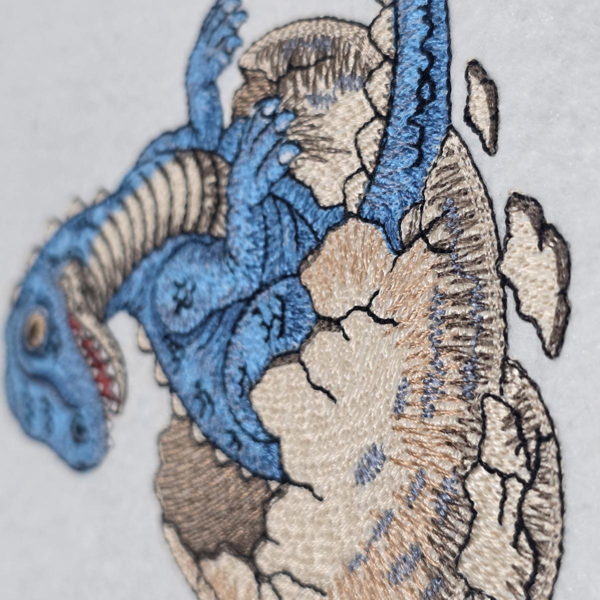 baby-dinosaur-hatching-embroidery-design