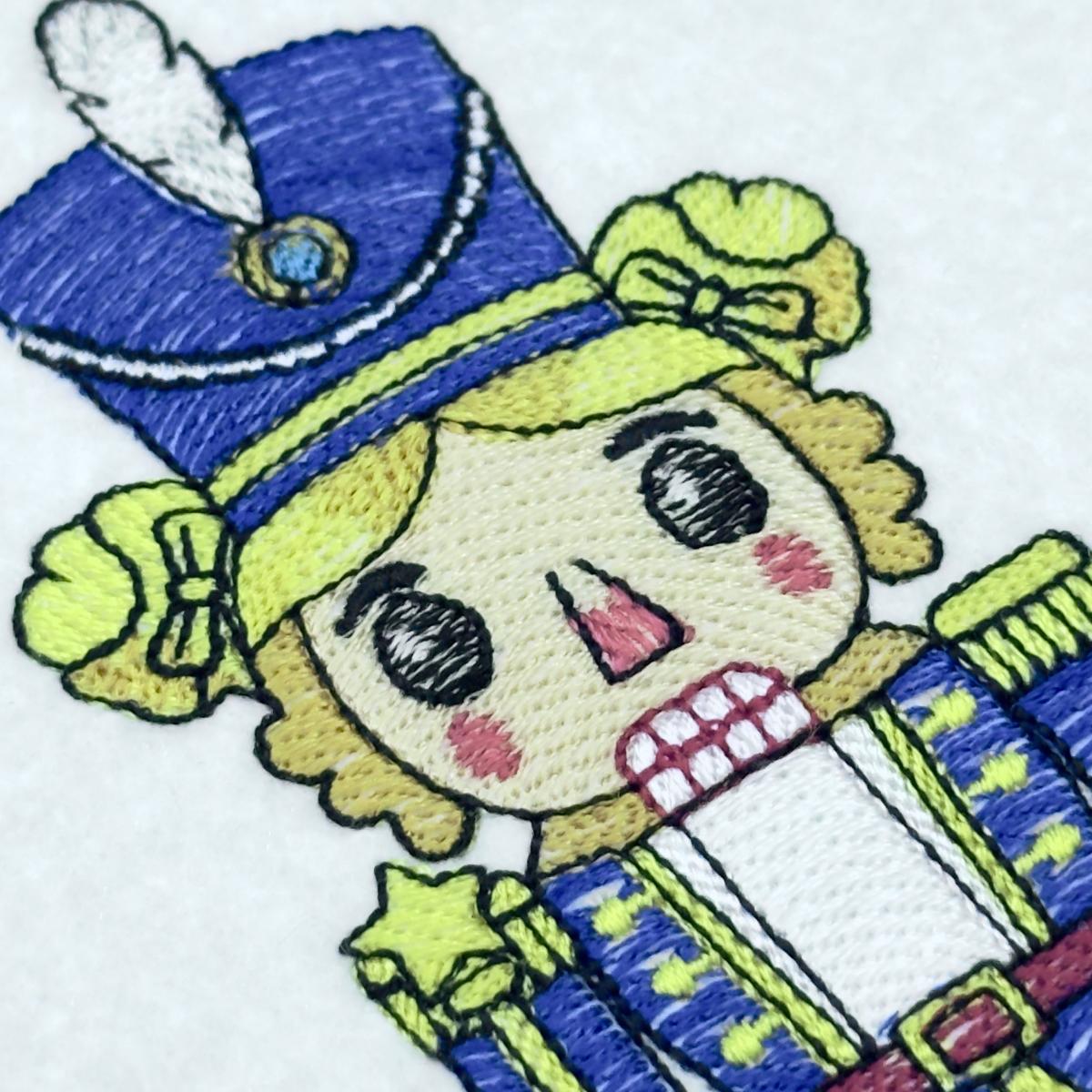 blue-girl-nutcracker-soldier-embroidery-design
