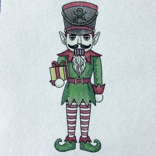 christmas-elf-nutcracker-holding-gift