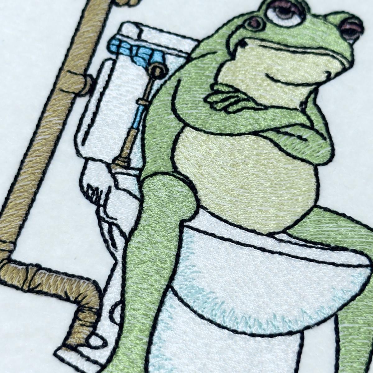 grumpy-frog-on-toilet-embroidery-design