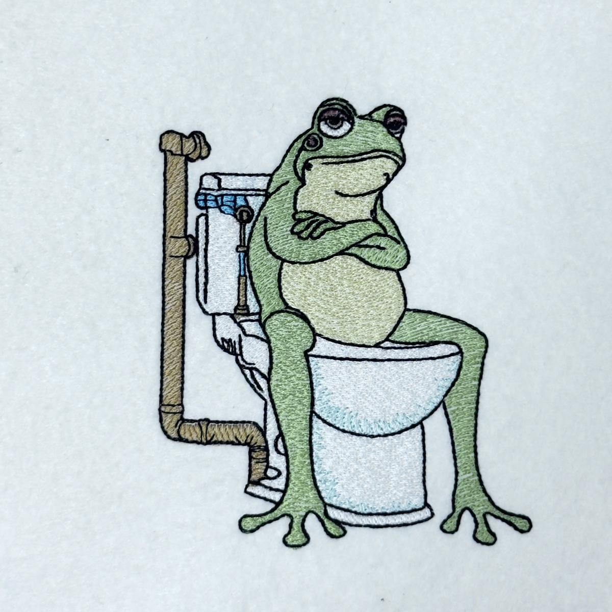 grumpy-frog-on-toilet