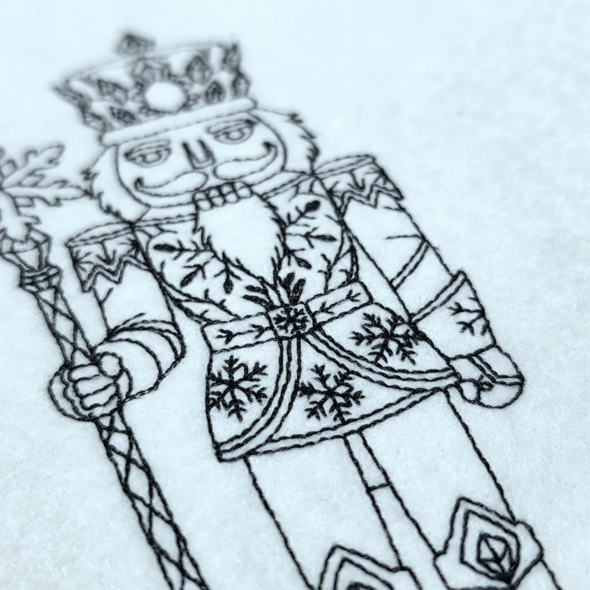 ice-crystal-nutcracker-line-art-embroidery-design