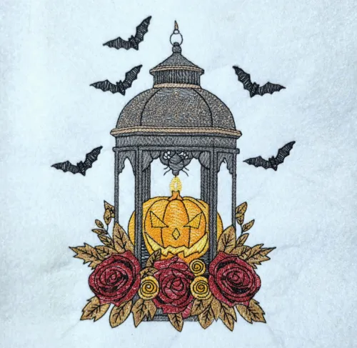 Pumpkin In Lantern With Roses