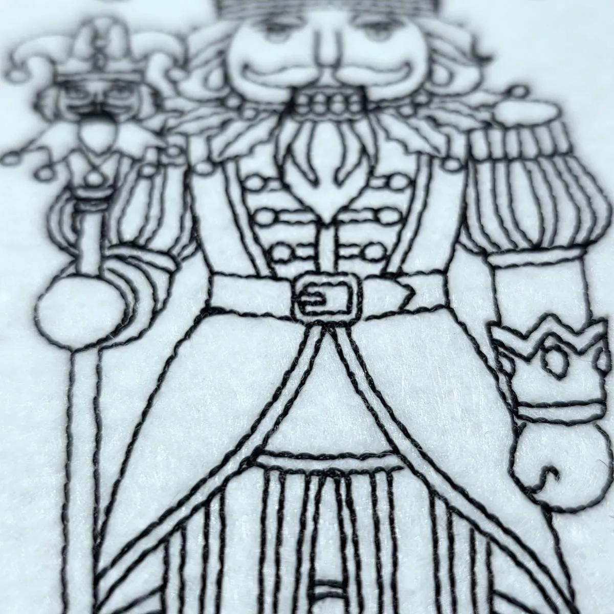 royal-harlequin-nutcracker-king-line-art-embroidery-design