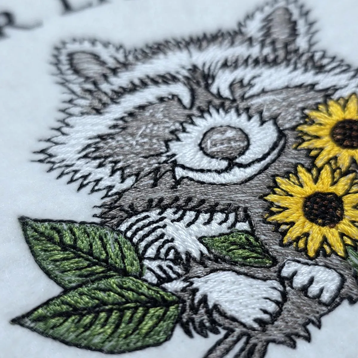 sarcastic-sunshine-raccoon-embroidery-design