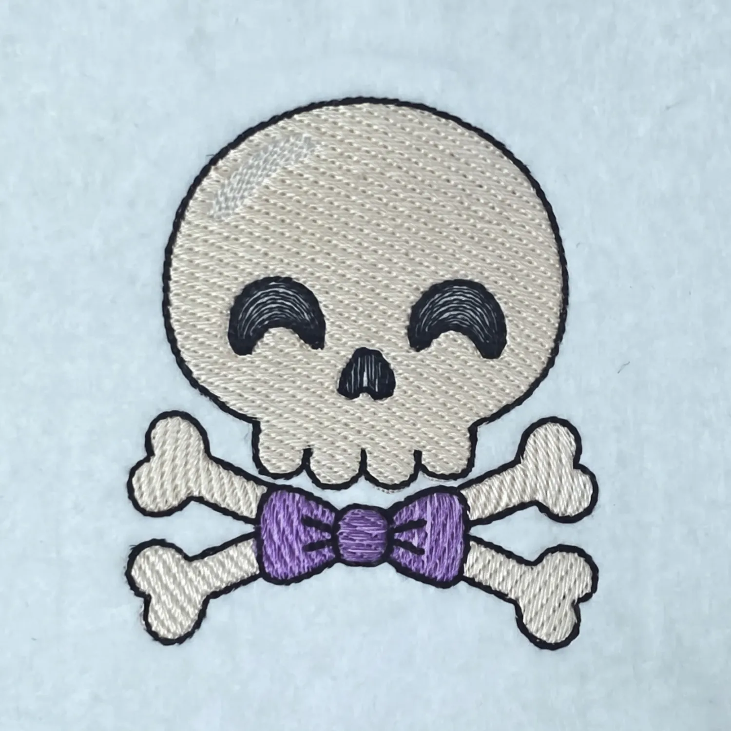 Skull And Crossbones With Bow Tie