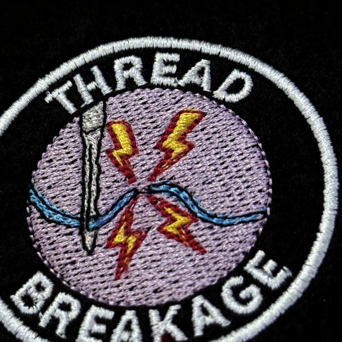 thread-breakage-machine-tag-embroidery-design